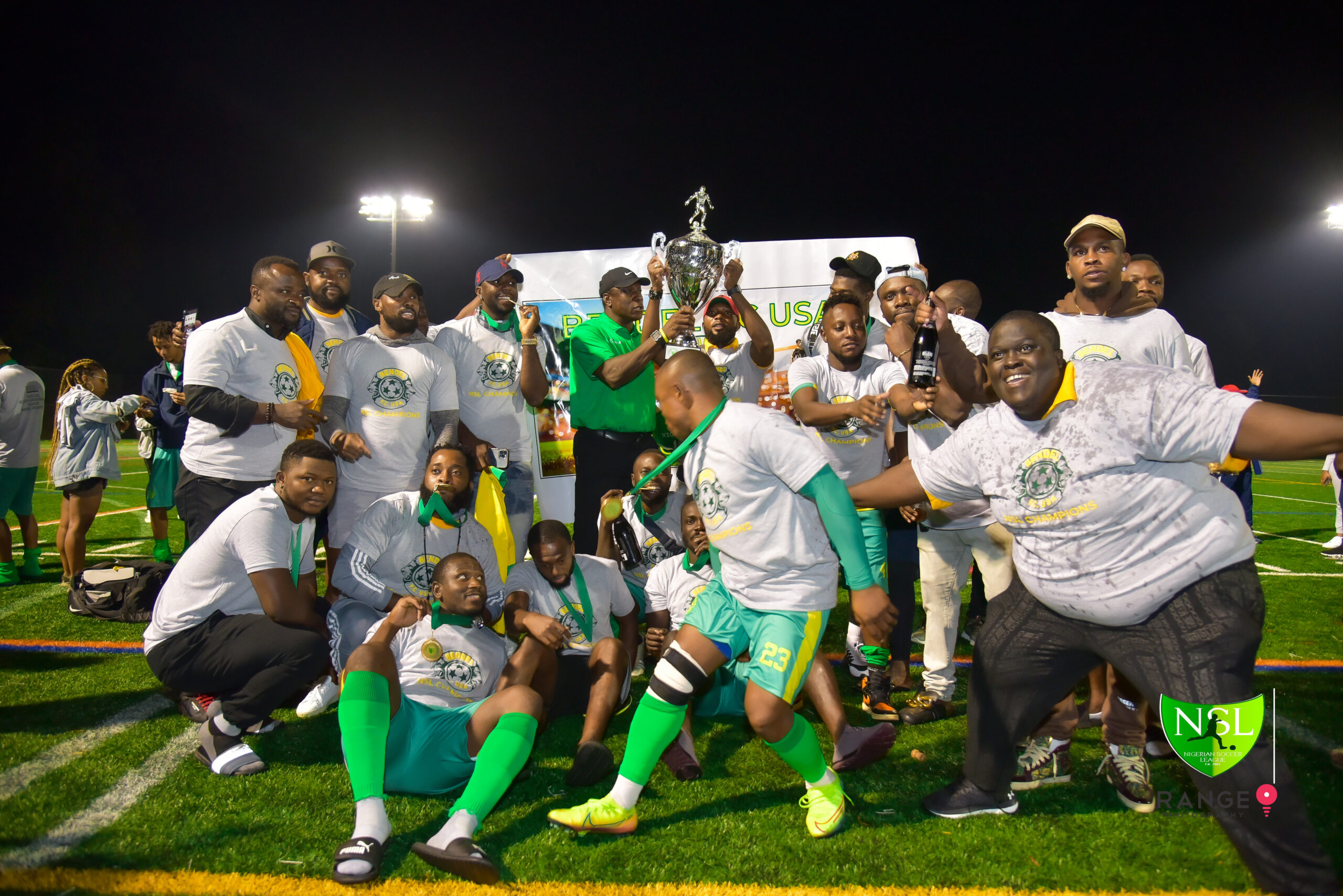 NSL team celebration with trophy